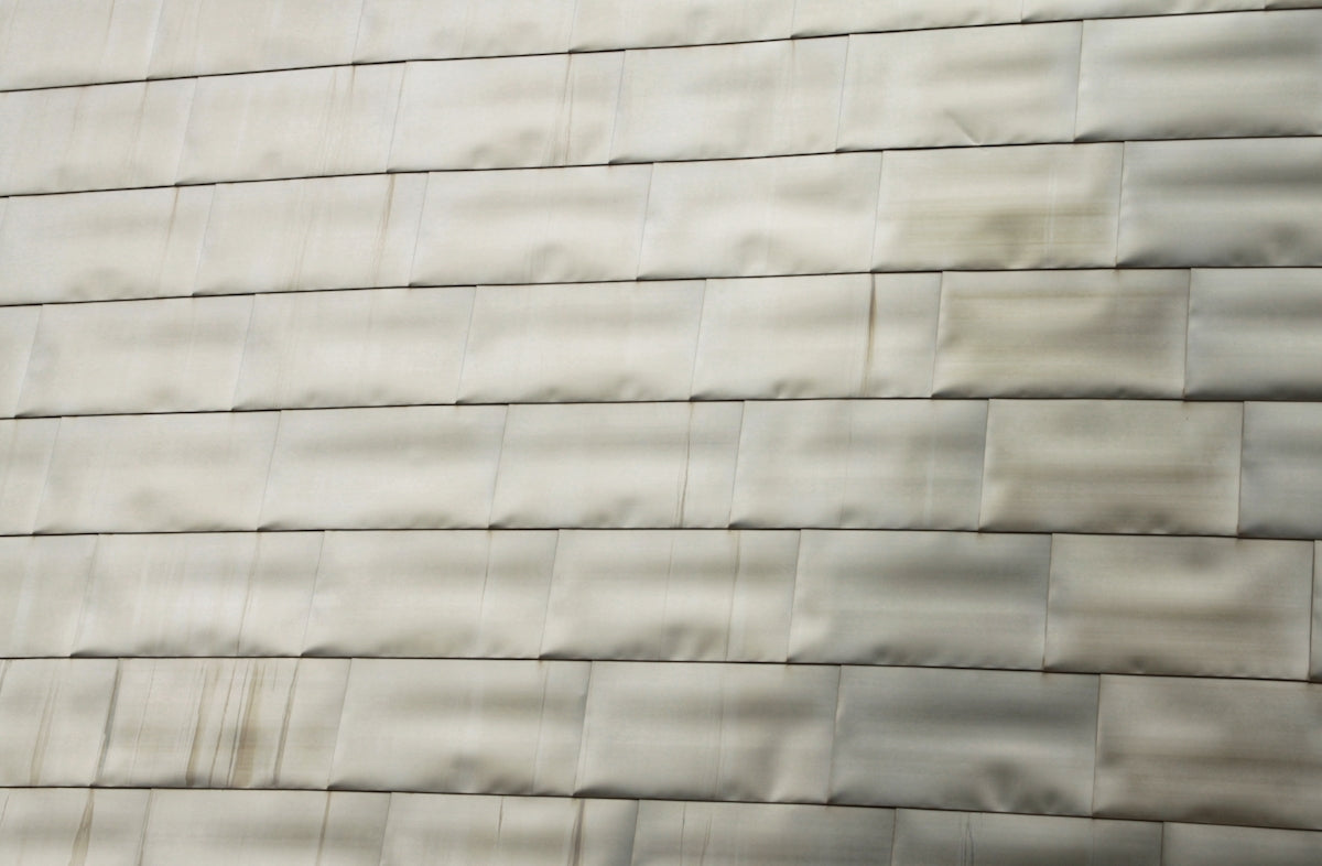 a close up of a wall made of tiles