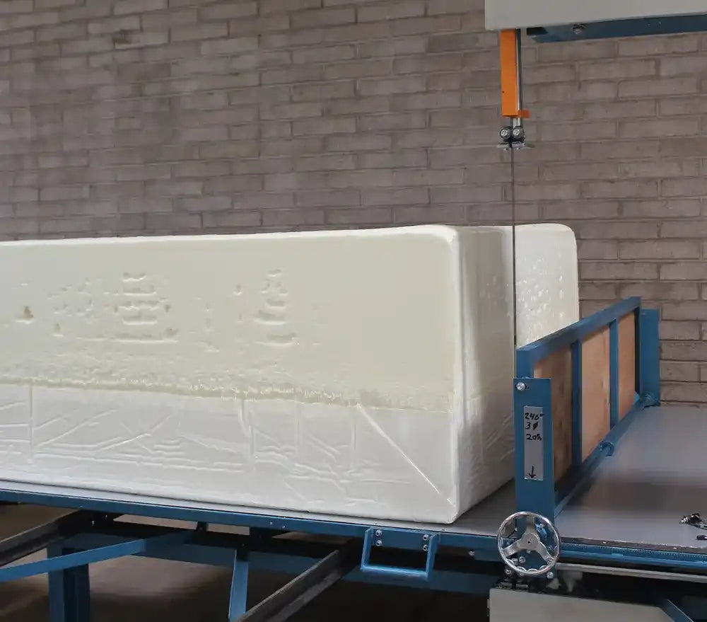 Foam block being cut by a wire saw.