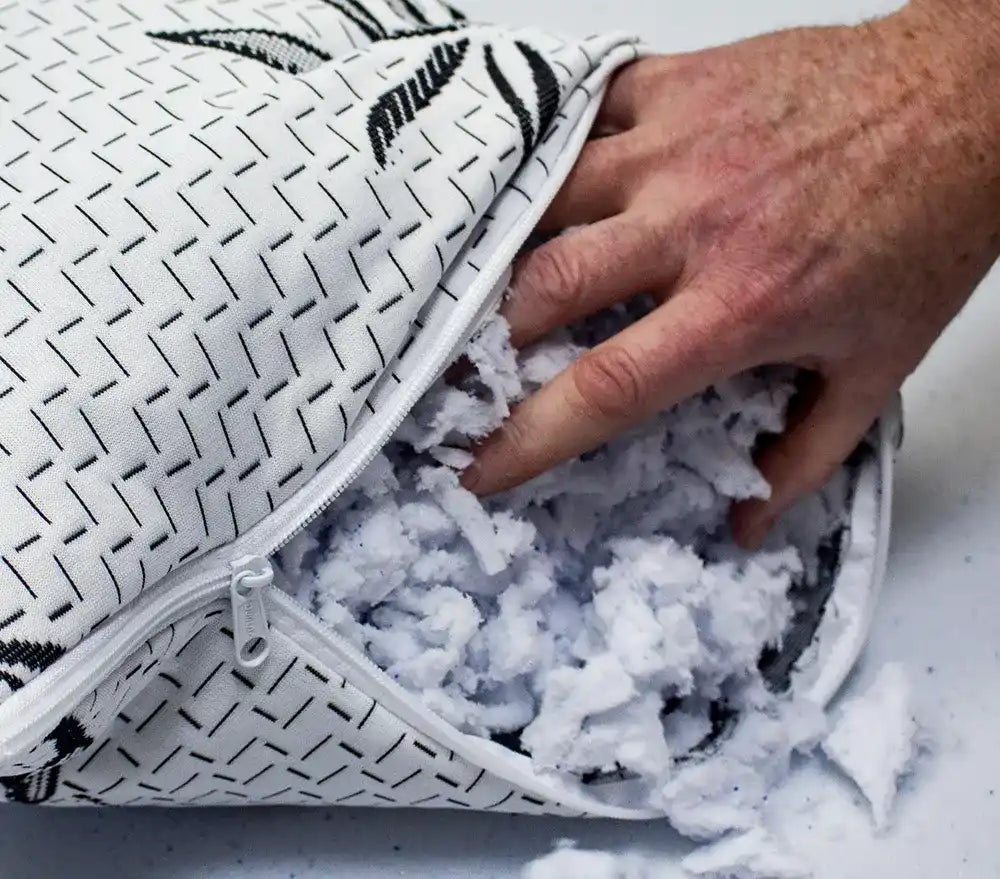Open pillow with shredded filling.