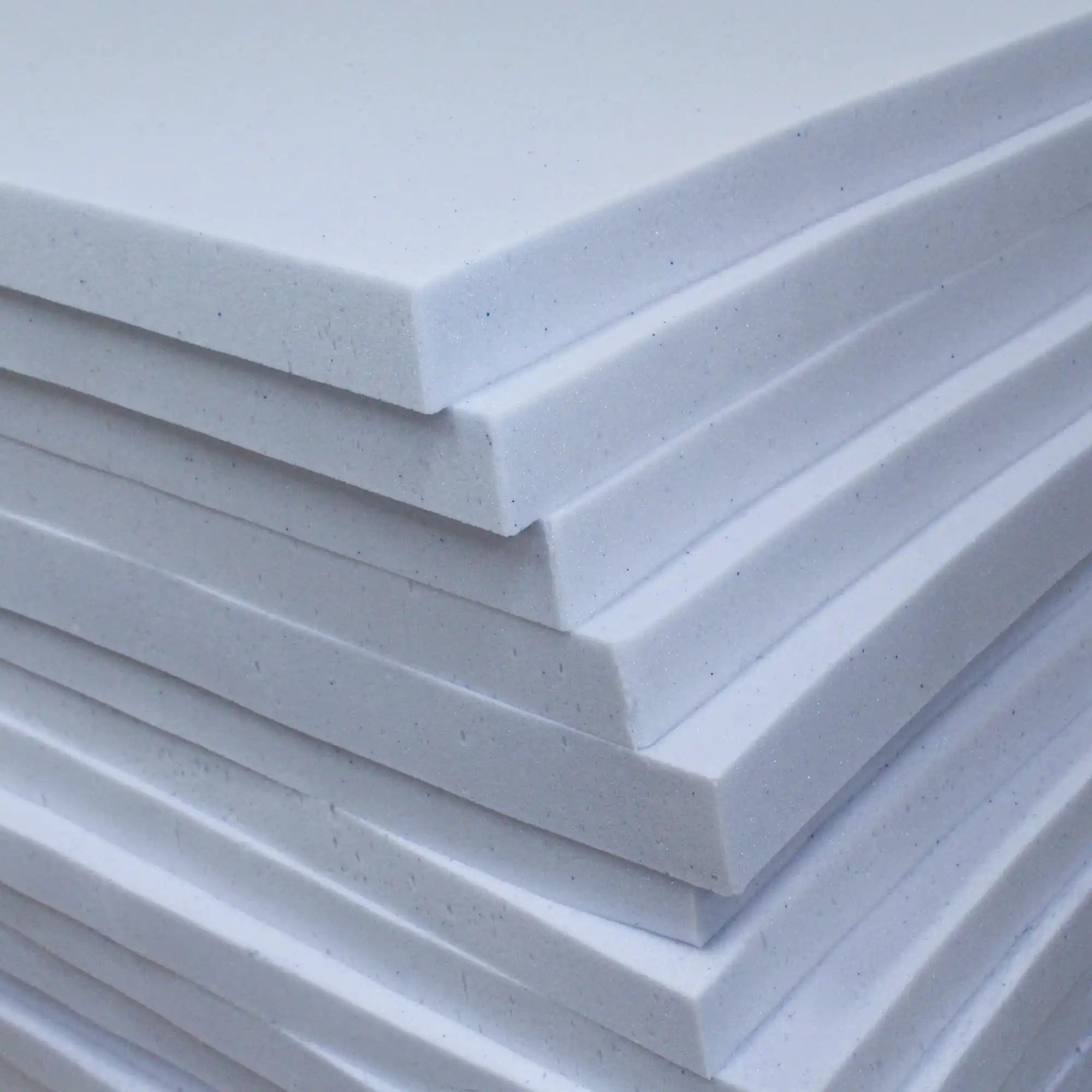 Stack of LOUNJ Gel Memory Foam Mattress Toppers