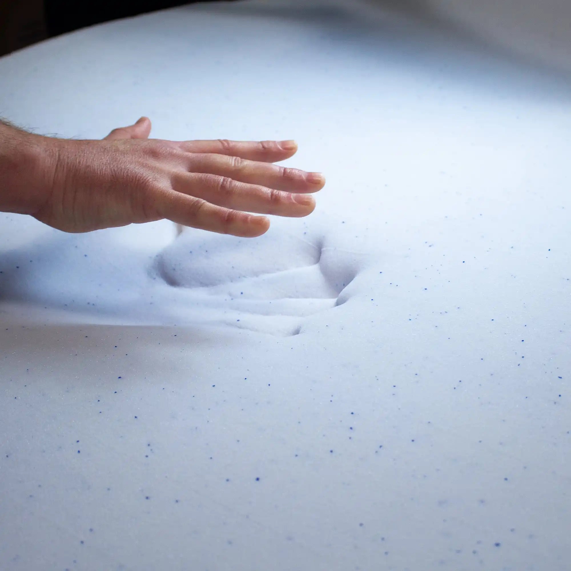 Memory foam mattress being tested.